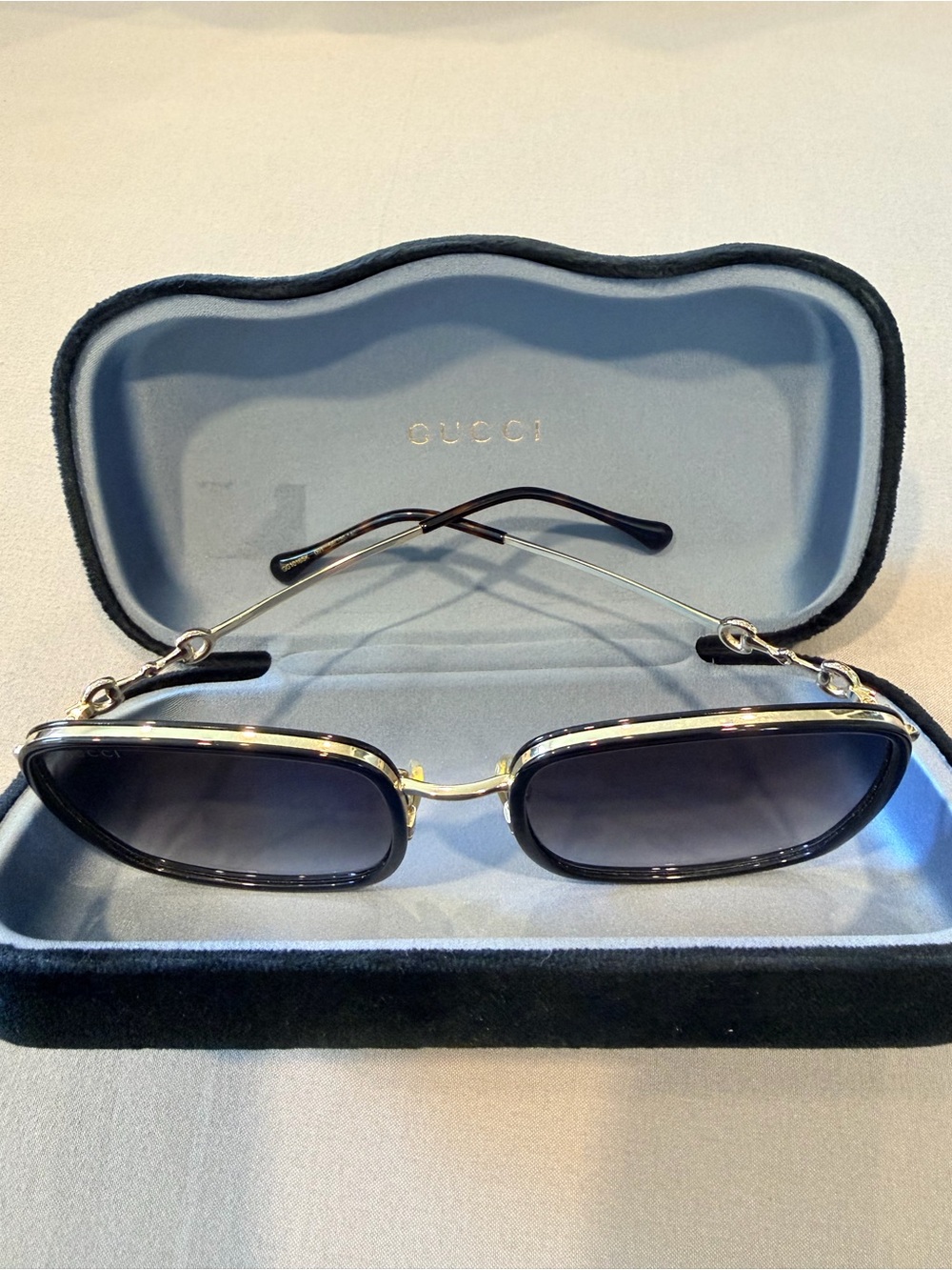 Gucci Black and Gold Oval Sunglasses